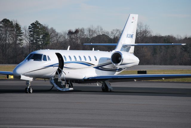 Cessna Citation Sovereign (N38WE) - WHELEN ENGINEERING INC at KJQF for the opening of the NASCAR Hall of Fames newest exhibit sponsored by Whelen Engineering Company. The "Whelen Hall of Champions" honors all national and regional champions from the 67-year history of NASCAR. - 12/11/14