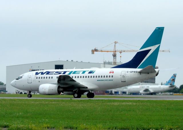 BOEING 737-600 (C-GPWS) - Heading for Vancouver Intl Airport.