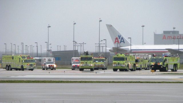 Boeing 777-200 — - ORD Mass disaster drill. ARFF trucks stage in front of AA hangar in preparation for drill. Nov. 2008.