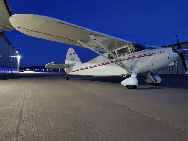 Piper 108 Voyager (N97186) - Stinson waiting to return to the hangar after a twilight flight.