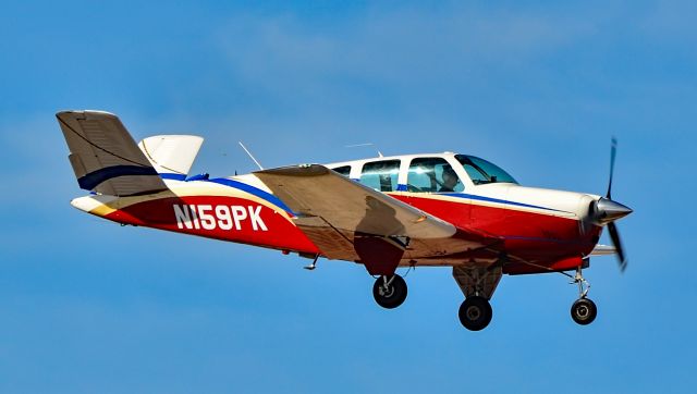 Beechcraft 35 Bonanza (N159PK) - N159PK 1957 Beech J35 Bonanza s/n D-5363 - North Las Vegas Airport  KVGTbr /Photo: TDelCorobr /April 17, 2024