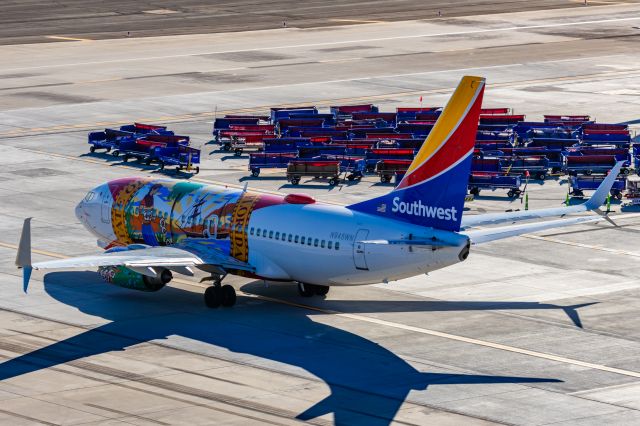 Boeing 737-700 (N945WN) - A Southwest 737-700 in Florida One special livery taxiing at PHX on 2/12/23 during the Super Bowl rush. Taken with a Canon R7 and Canon EF 100-400 II L lens.