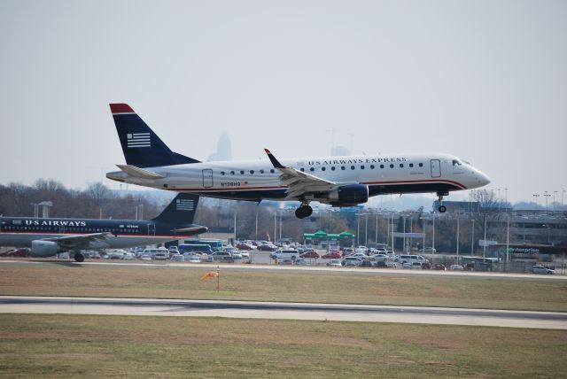 Embraer ERJ 175 (N136HQ) - Approaching runway 18C - 3/11/09