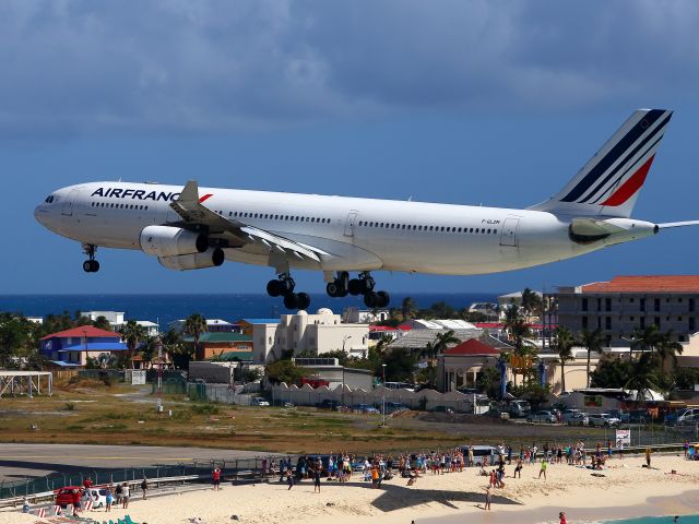 Airbus A340-300 (F-GLZM) - Landing above incredible Maho Beach.View from Sonesta Hostel.