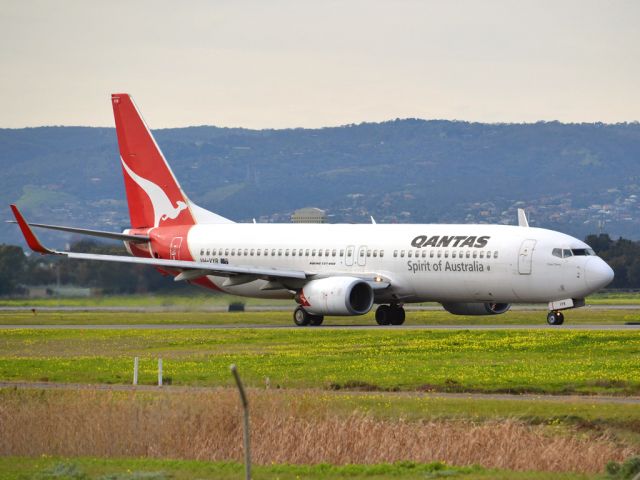 Boeing 737-800 (VH-VYB) - On taxi-way heading for take off on runway 05. Thursday, 12th July 2012.