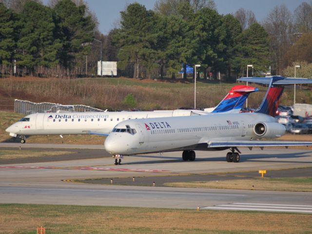 Cessna Citation Excel/XLS (KCLT) - A Delta MD88 jumping line ahead of company traffic. - 3/18/11