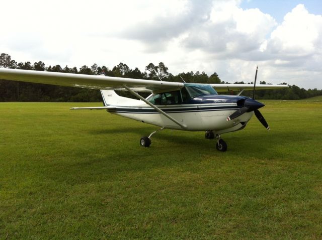 Cessna Skylane (N6245S) - N6245S parked on grass.