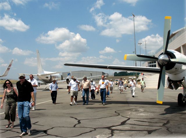 Grumman Gulfstream 1 (ZS-JIS) - Boarding of the pax for a flight to FYWB, Namibia.