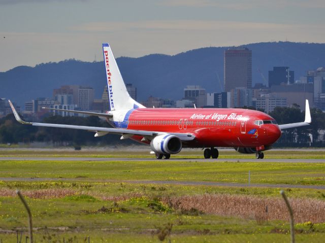 Boeing 737-800 (VH-VOX) - On taxi-way heading for take off on runway 05. Thursday 12th July 2012.