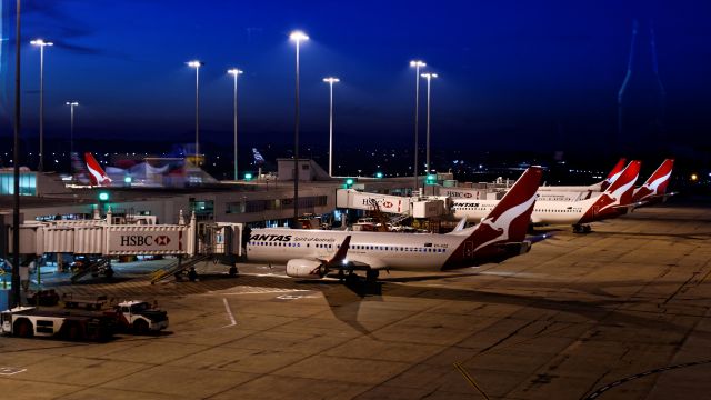 Boeing 737-800 (VH-VZZ) - TAKEN FROM THE LOUNGE, THIS IS ONE PHOTO THAT I AM PROUD TO HAVE TAKEN!