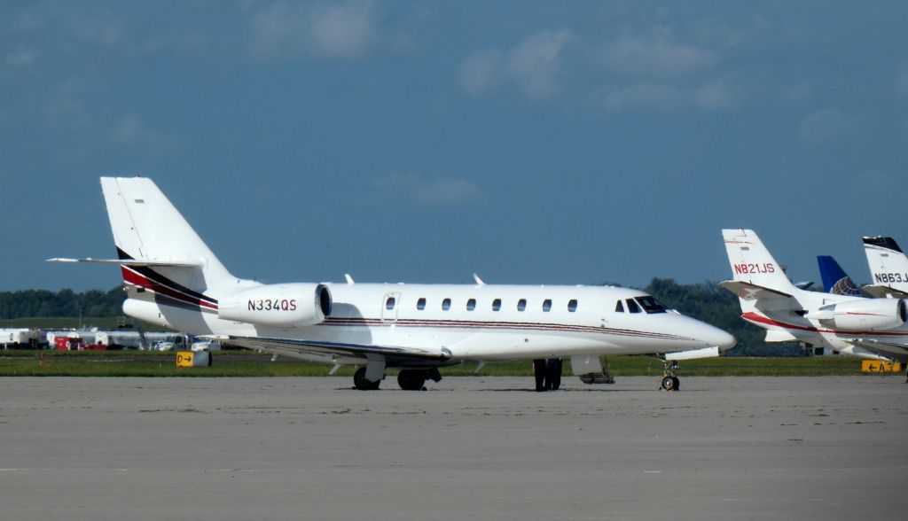 Cessna Citation Sovereign (N334QS) - Catching some tarmac time is this 2007 Cessna Citation Soverign 680 from the Summer of 2020.