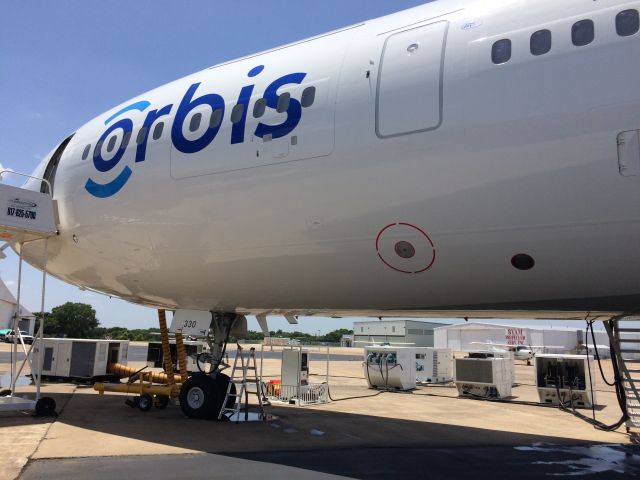 McDonnell Douglas DC-10 (N330AU) - Heres something you dont see every day.  These are the portable ground power, air conditioning and water purification plants carried aboard ORBIS.   80% of blindness is preventable.