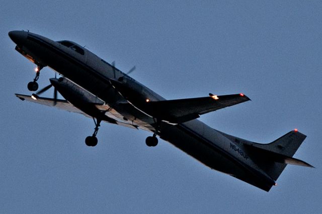 Fairchild Dornier SA-227DC Metro (N548UP) - 12/9/12:  Ameriflight 702 on short final approach after sunset over Miami Lakes enroute to runway 9L at Opa-locka Executive Airport after a flight from KMCO.