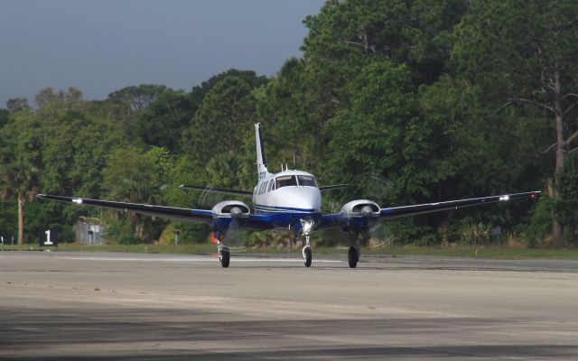 Beechcraft Queen Air (65) (C-FBOY) - Departing from Spruce Creek 2013