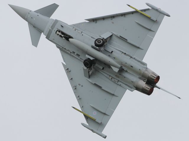 — — - The Typhoon cleans up aerodynamically, as it commences it's flight display at Farnborough International Airshow 2012.