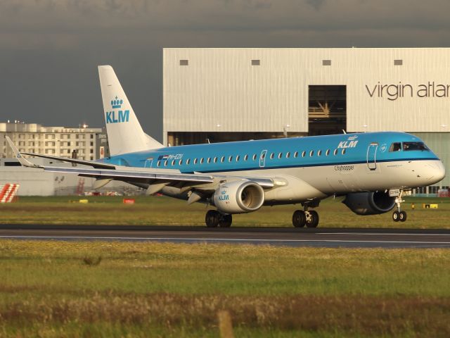 Embraer 170/175 (PH-EZU) - KLM E170 touches down at LHR runway 027R.