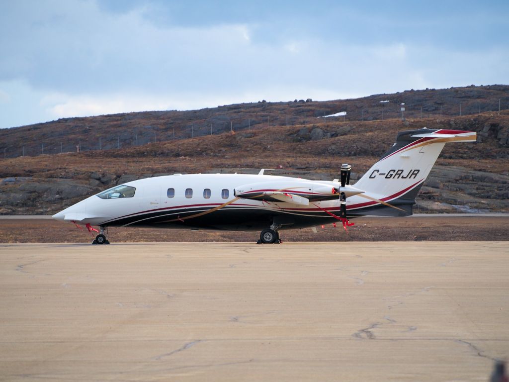 Piaggio P.180 Avanti (C-GRJR) - Parked at the Iqaluit airport. June 9, 2014