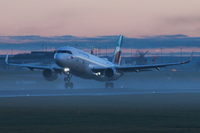 Airbus A320 (D-AEWK) - EWG9341 on an early morning departure back to Dusseldorf and flying through some low-lying mist.