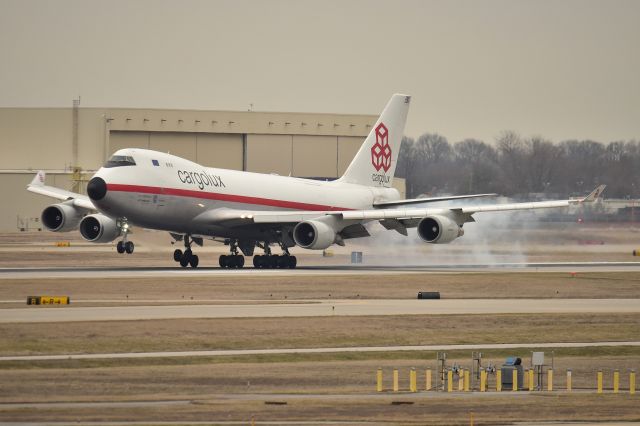 Boeing 747-400 (LX-NCL) - CLX'S Beautiful Retro bird touching down 23-R on 03-01-24. We don't get to see her much here at IND, but when we do, she usually comes in in cruddy light & wx, like yesterday.