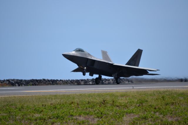 Lockheed F-22 Raptor — - An F-22 taking off from Honolulu on reef runway.