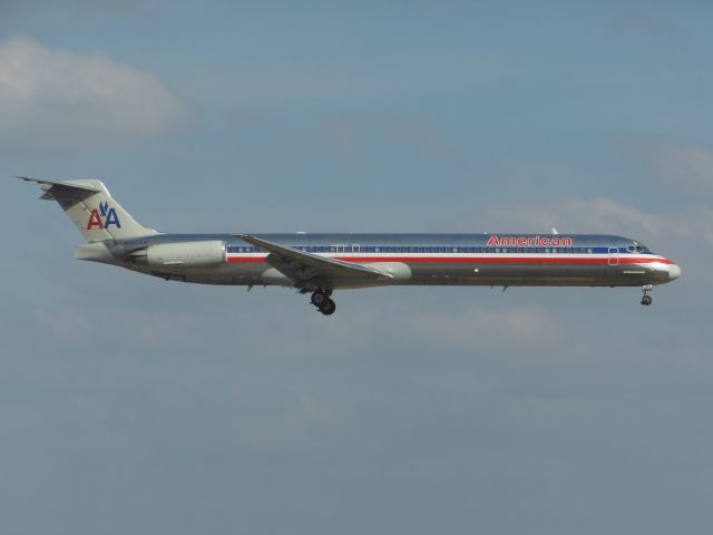 McDonnell Douglas MD-82 (N513AA) - American Airlines (AA) N513AA MD-82 [cn49890]br /Dallas-Fort Worth (DFW). American Airlines flight AA338 just arrived at Terminal C Gates from Atlanta (ATL). This classic bare metal livery, first deployed in the late 1960’s was replaced by a new white livery in 2013 following the merger with US Airways. The MD ‘Super’ 80 fleet was not repainted due to imminent retirement. After completing 31,753 cycles this aircraft’s last revenue flight was in January 2016, since when it has been stored at Roswell (ROS).br /Taken from Founders Plaza Observation Area, North Airfield Drivebr /2014 03 24  a rel=nofollow href=http://alphayankee.smugmug.com/Airlines-and-Airliners-Portfolio/Airlines/AmericasAirlines/American-Airlines-AA/i-kkJDQnbhttps://alphayankee.smugmug.com/Airlines-and-Airliners-Portfolio/Airlines/AmericasAirlines/American-Airlines-AA/i-kkJDQnb/a