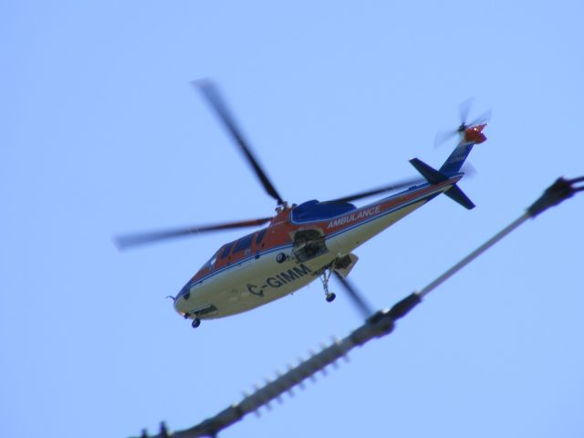 Sikorsky S-76 (C-GIMM) - Air ambulance coming in for landing after delivering a patient, to the Ottawa Civic Hospital.