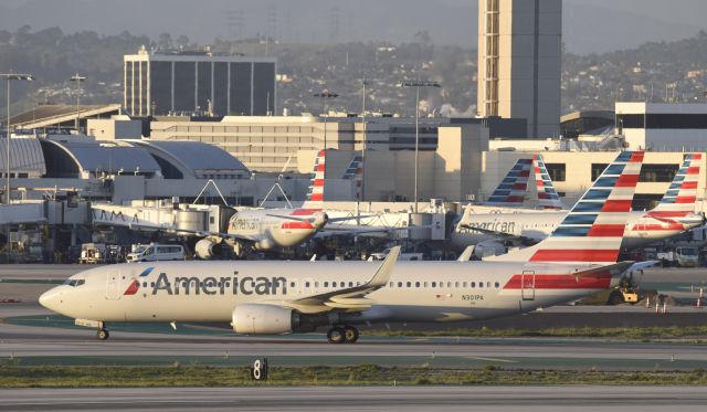 Boeing 737-800 (N301PA) - taxiing to gate after landing on 25L at LAX