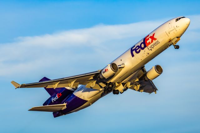 Boeing MD-11 (N594FE) - I haven’t posted on FlightAware in nearly two years, so I thought it’d be nice to go back to my roots and put up some of my best work from 2024 on here! If you enjoy my work, follow me @phxplanepics on Instagram!