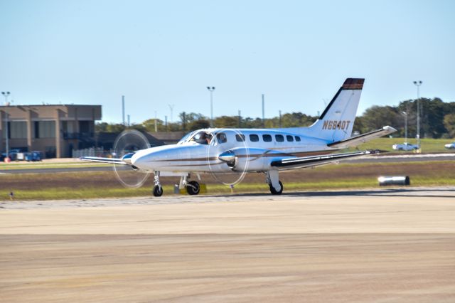 Cessna Conquest 2 (N6840T) - Cessna 441 Conquest taxiing out in front of Gate 12 Bar & Grill!br /br /br /Also check out my new online store at https://jwhatphotography.com Custom prints are available. It will slowly be updated through time.