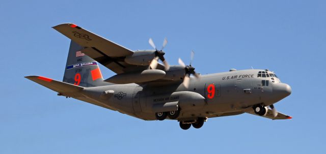 Lockheed C-130 Hercules (93-7311) - A NevANG "High Rollers" C-130H (93-7311) is snapped here as it is approaching Reno Tahoe International.  It was landing on runway 16L; side-by-side with a SW B737 that was passing right over my head as it was landing on 16R.  I did get a good click of both of them approaching next to each other, but naturally as they came over me they were too close for me to get them together in this pic.