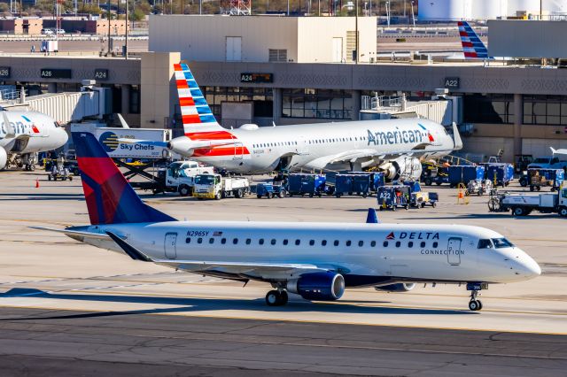 Embraer 175 (N296SY) - A Delta Connection ERJ175 taxiing at PHX on 2/10/23 during the Super Bowl rush. Taken with a Canon R7 and Canon EF 100-400 II L lens.