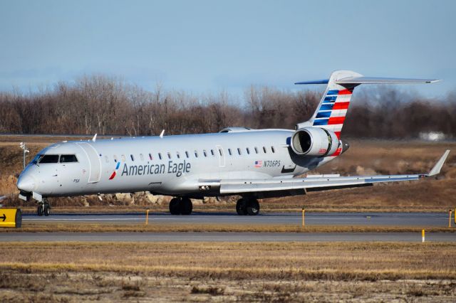 Canadair Regional Jet CRJ-700 (N706PS) - N706PS landing on Runway 32 at the Buffalo Niagara International Airport from Charlotte (KCLT) as JIA5075