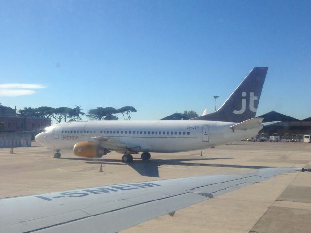 Boeing 737-700 (OY-JTF) - Parked at LIRN (Napoli-Capodichino) 06/11/2013 10:03