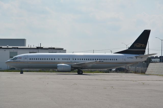 BOEING 737-400 (C-FLEJ) - This Flair air was standing at the North Lounge in Toronto Airport.