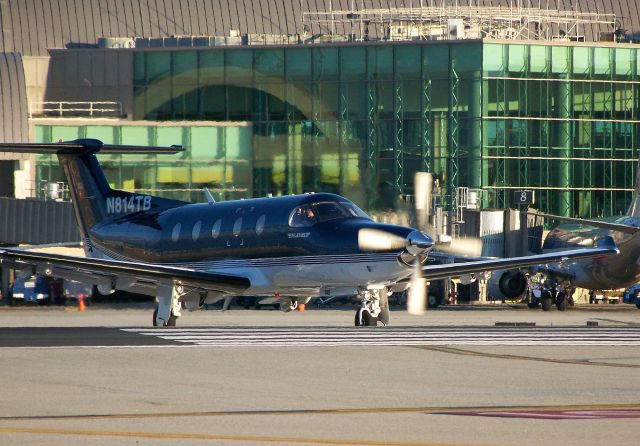 Pilatus PC-12 (N814TB) - Another one of the older pictures that I found on my computer. This PC-12 is is seen taxing onto runway 19R (now 20R)