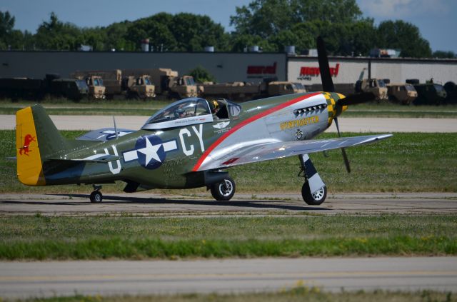 North American P-51 Mustang — - EAA 2011 P-51D "Gunfighter" taxiing.