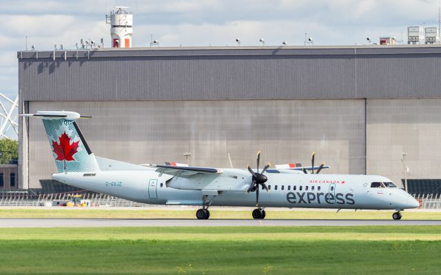 de Havilland Dash 8-400 (C-GVJZ) - JZA8717 arrives in Montreal from just down the road at Quebec/Jean Lesage Intl, a flight time of just 32 minutes