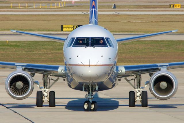 Embraer 170/175 (N120SY) - Taxiing to gate with one engine.