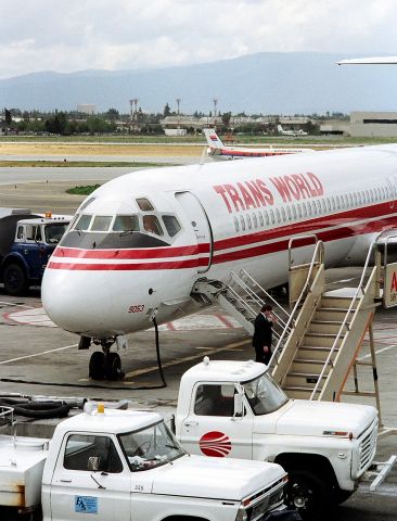 McDonnell Douglas MD-80 (N953U) - KSJC- I never could figure out why the on-board airstairs were used to load/onload here at SJC when there were plenty of airstairs available. Filmed from the old Obs deck at SJC - Obs deck now gone forever!