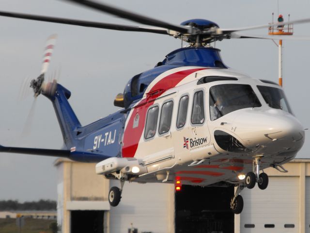 BELL-AGUSTA AB-139 (9Y-TAJ) - Bristow helicopter hover taxi to the pads