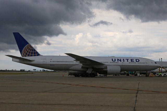 Boeing 777-200 (N227UA) - UAL78 (B777-222ER) from Narita Intl Airport being refueled at the gate after being diverted from Newark (KEWR) due to thunderstorms on 19 Jun 2017.