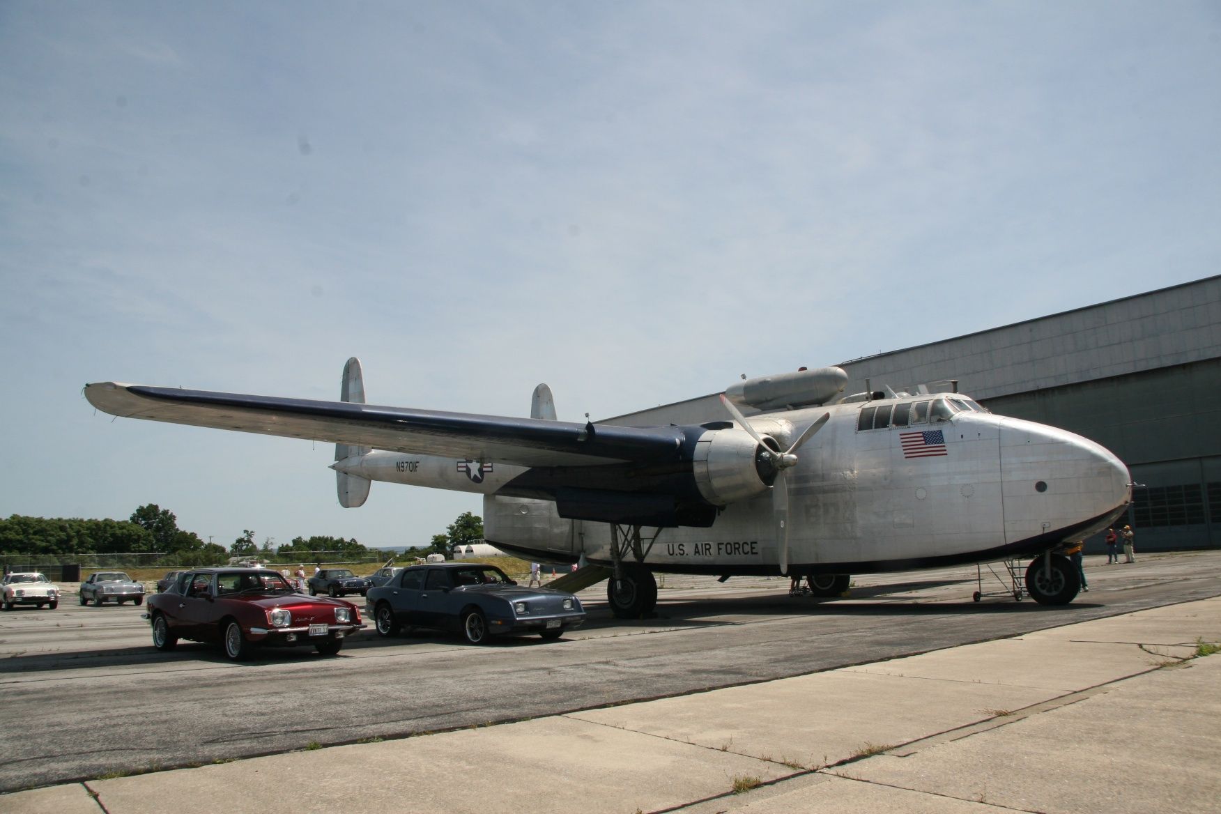 FAIRCHILD (1) Packet (N9701F) - This Fairchild C-82 "Packet" was wheeled out of the Hagerstown Aviation Museums hanger June 28, 2014 for a reunion with 11 Avanti automobiles. A similar C-82 still in Greybull, WY (N5102B) flew two brand new Studebaker Avantis throughout the U.S. in 1962 during dealer introductions.