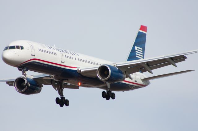 Boeing 757-200 (N939UW) - On final for runway 27R as flight 723 from Dublin Intl.