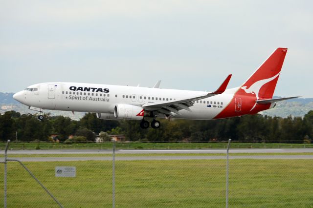 Boeing 737-800 (VH-VXK) - About to put down on runway 05. Thursday, 19 June 2014.