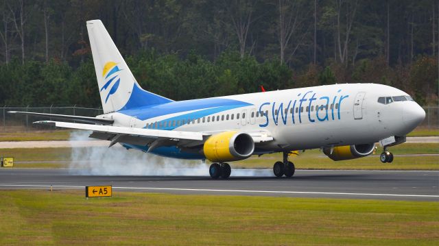 BOEING 737-400 (N807TJ) - Swift Air Boeing 737-400 (N807TJ) arrives KRDU Rwy 23R on 10/26/2019 at 4:45 pm.