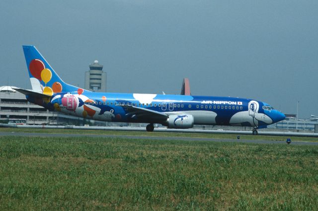 BOEING 737-400 (JA392K) - Taxing at Tokyo-Haneda Intl Airport on 2002/08/17 " Dolphin c/s "