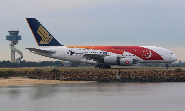 Airbus A380-800 (9V-SKI) - Singapore Airlines SQ232 Taxiing along alpha waering the SG50 colours. Taken from The Beach with a 70-200mm