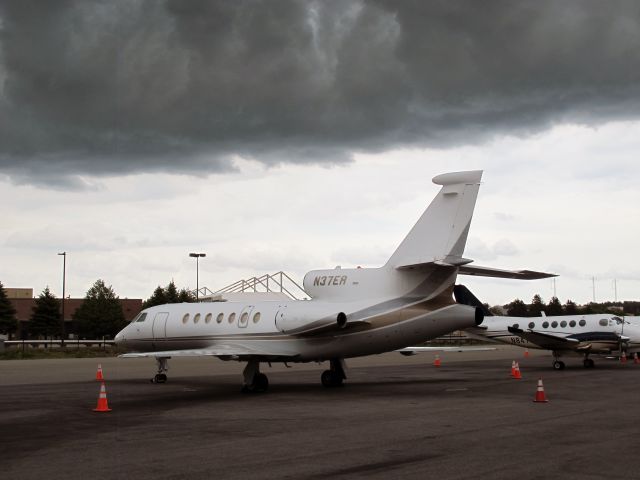 Dassault Falcon 50 (N37ER) - A storm moves over the airport | 28 May 2015