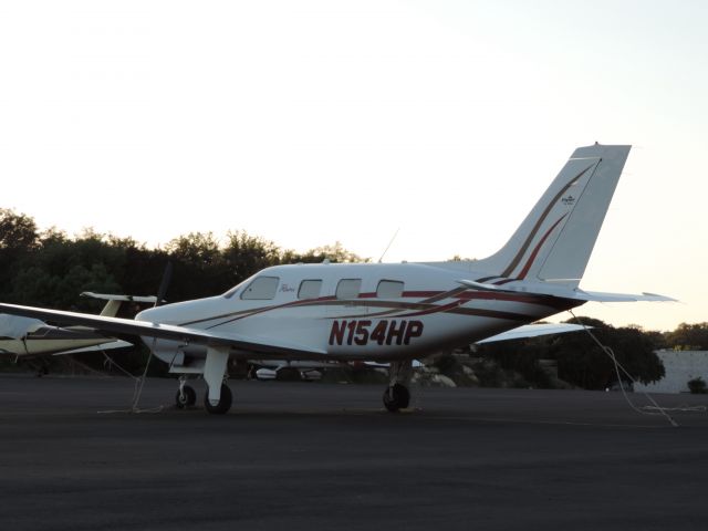 Piper Malibu Mirage (N154HP) - Piper Malibu parked at lakeway