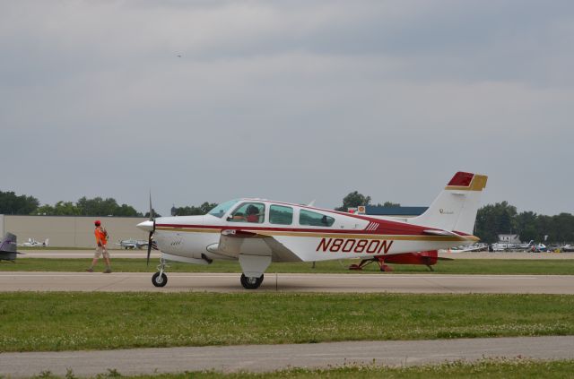 Beechcraft Bonanza (33) (N8080N) - Bonanza Mass Arrival at Oshkosh AirVenture 2014.